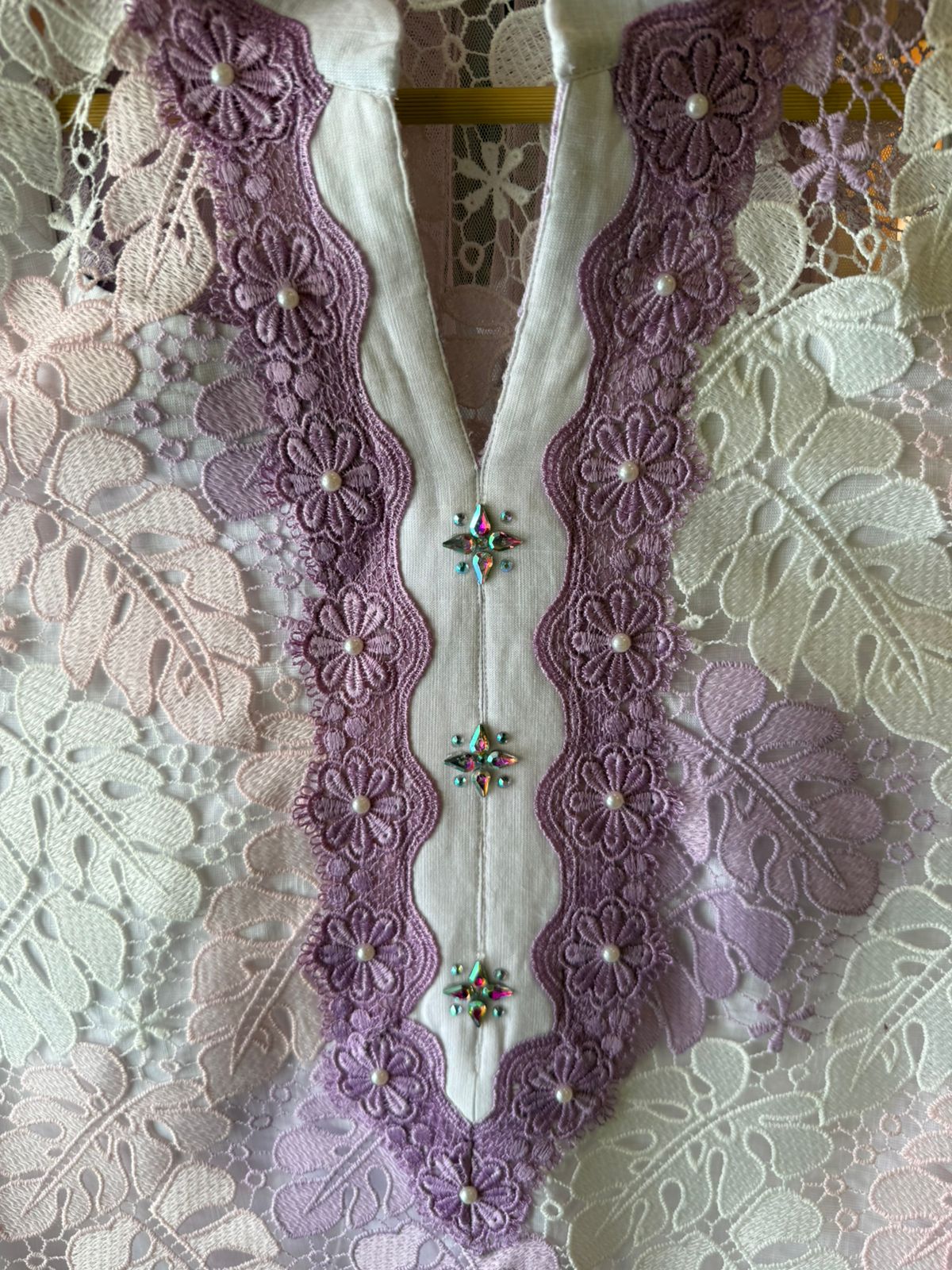 Premium pastel kurta crafted in intricate floral Crochet fabric