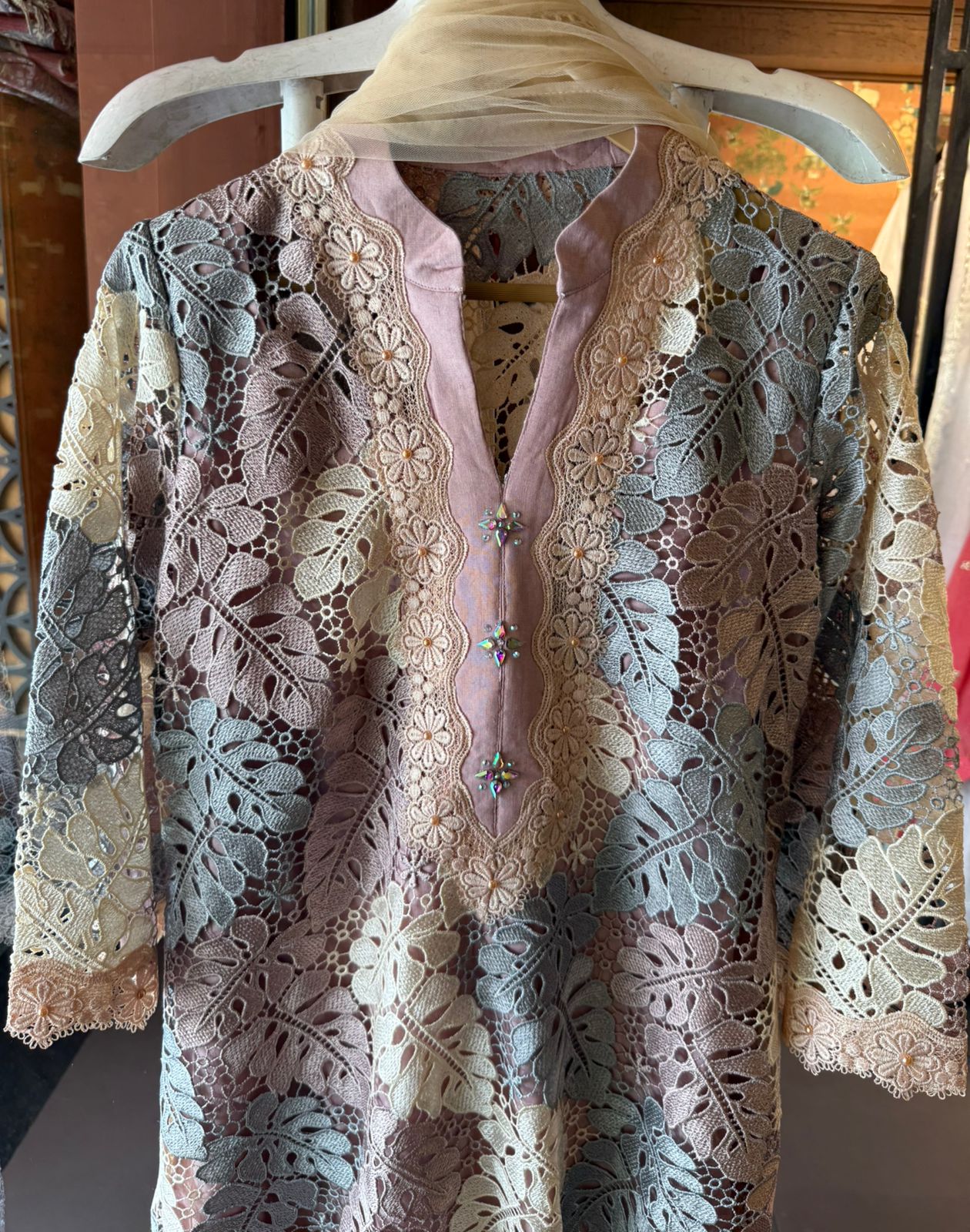 Premium pastel kurta crafted in intricate floral Crochet fabric