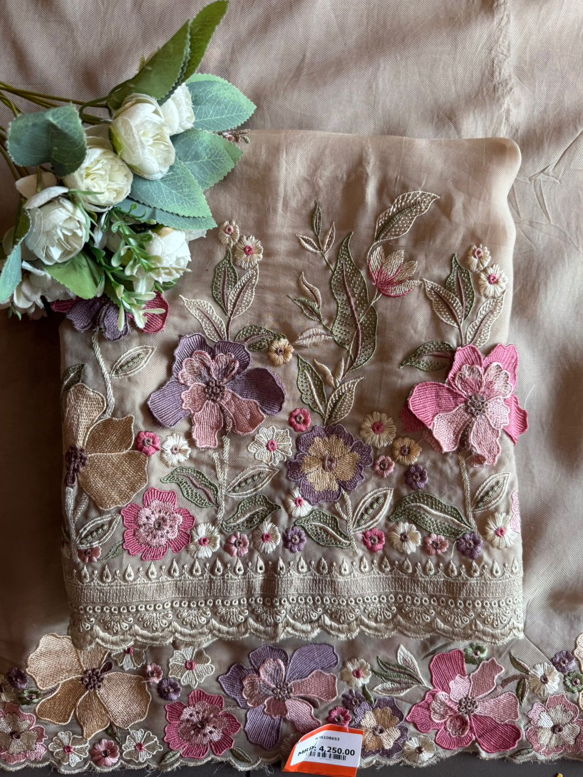 Floral embroidery in pastel hues timeless ensemble