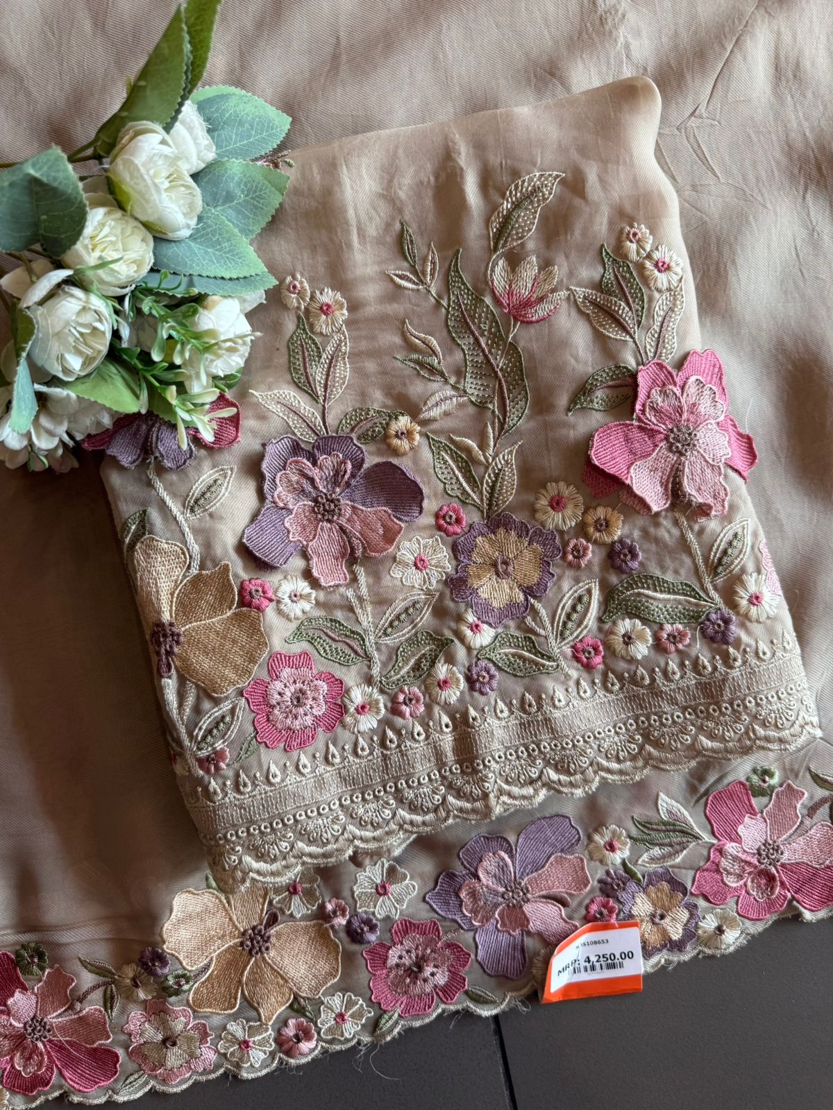 Floral embroidery in pastel hues timeless ensemble