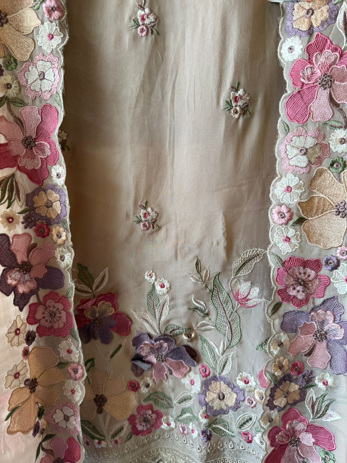 Floral embroidery in pastel hues timeless ensemble