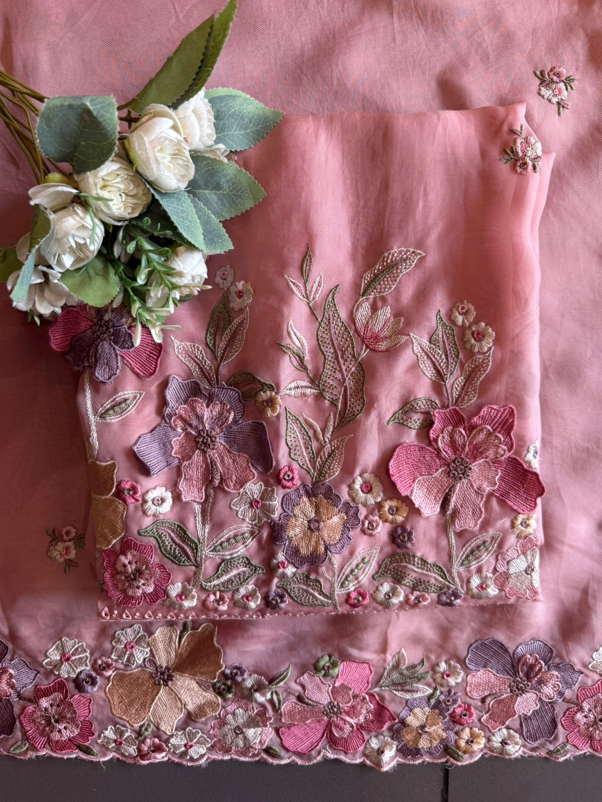 Floral embroidery in pastel hues timeless ensemble