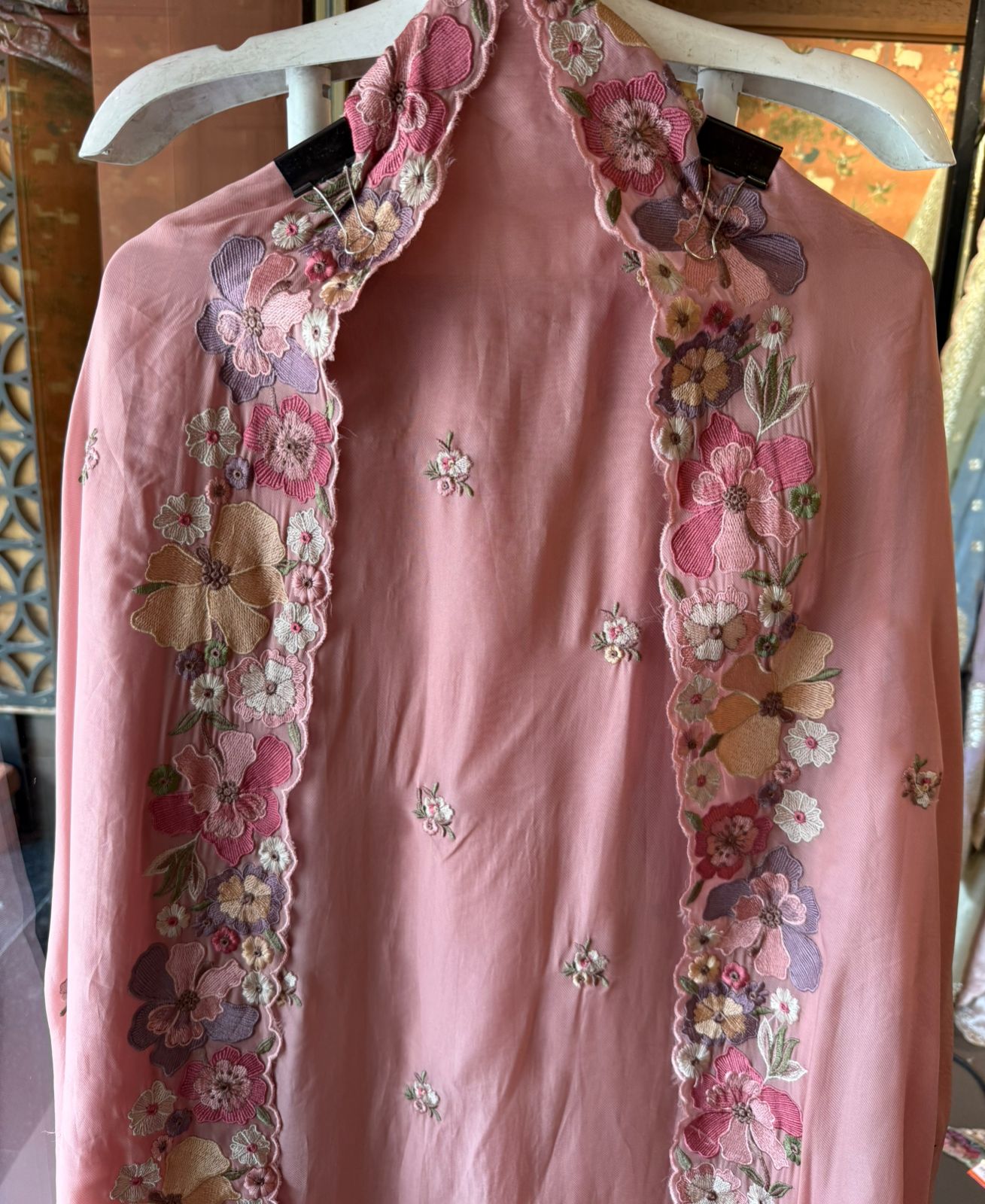 Floral embroidery in pastel hues timeless ensemble