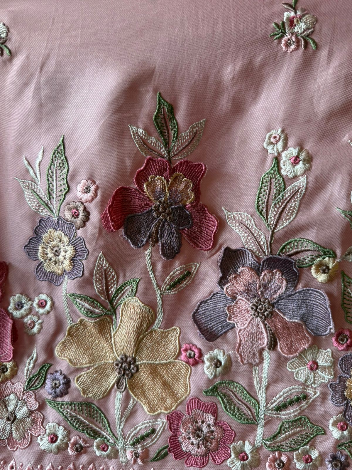 Floral embroidery in pastel hues timeless ensemble