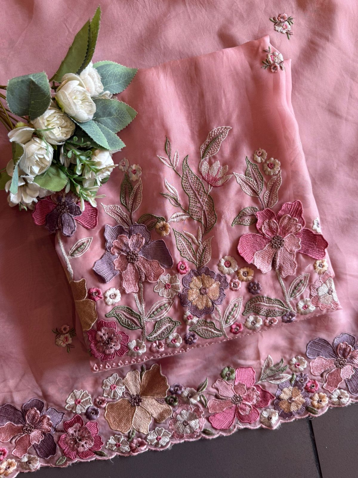 Floral embroidery in pastel hues timeless ensemble