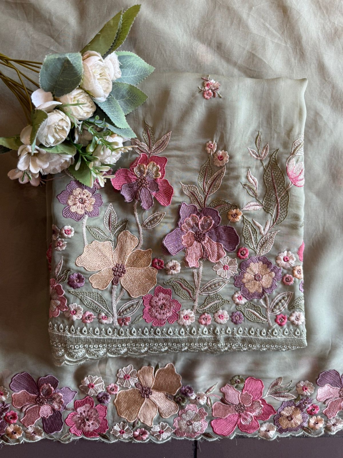 Floral embroidery in pastel hues timeless ensemble