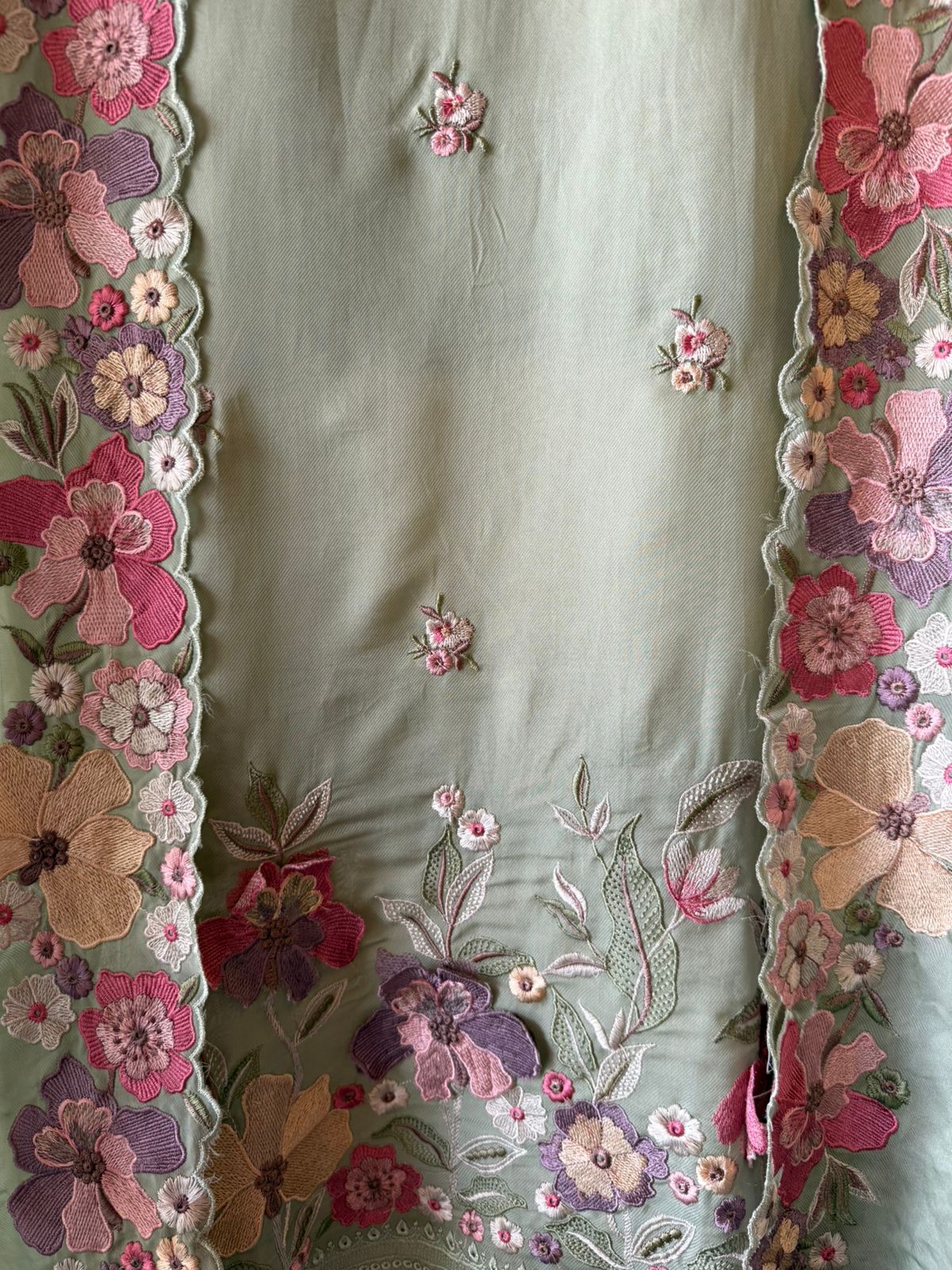 Floral embroidery in pastel hues timeless ensemble