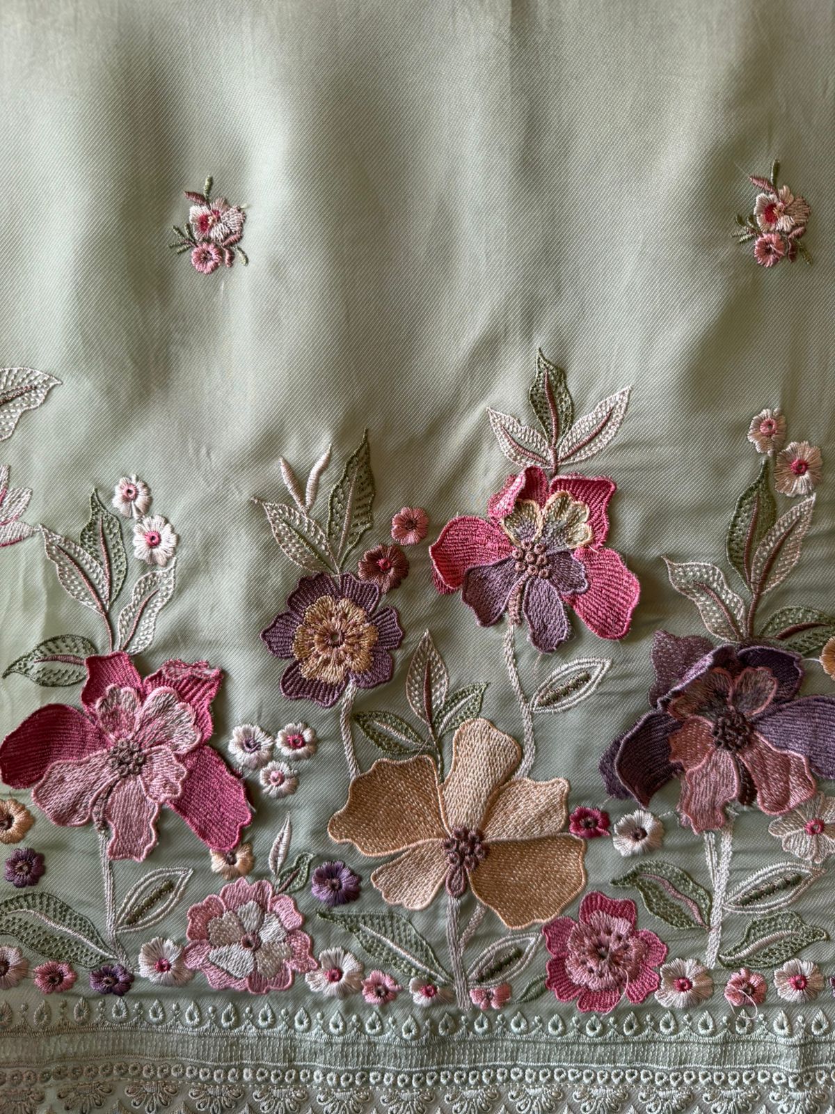Floral embroidery in pastel hues timeless ensemble