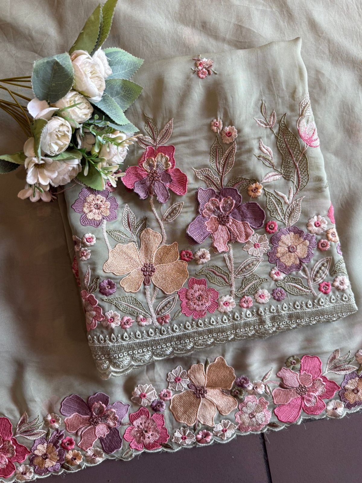 Floral embroidery in pastel hues timeless ensemble