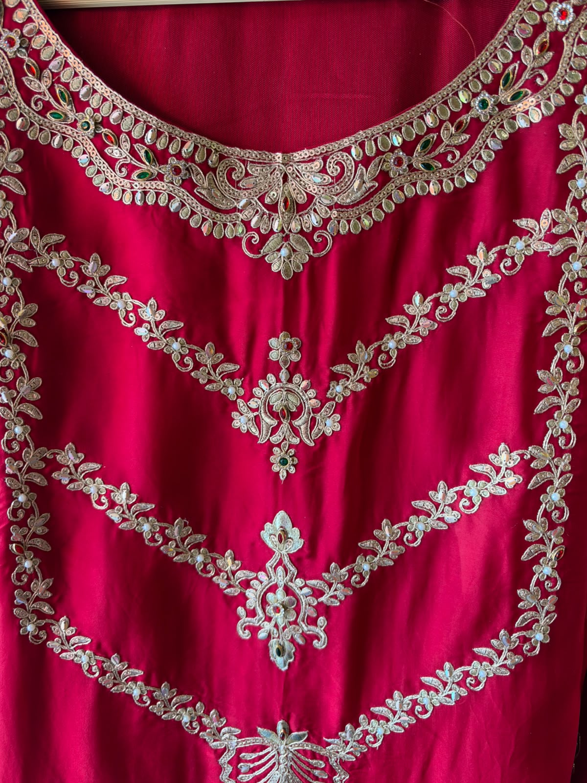Crafted in a rich Satin organza fabric with a smooth