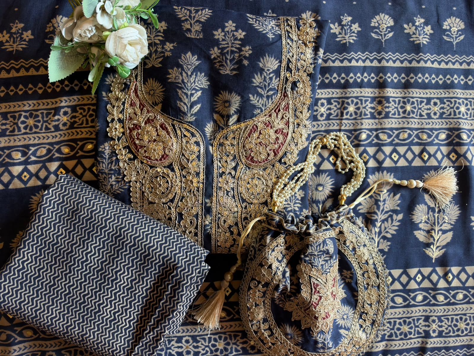 Ajrakh Printed Suit Set with Embroidered Potli