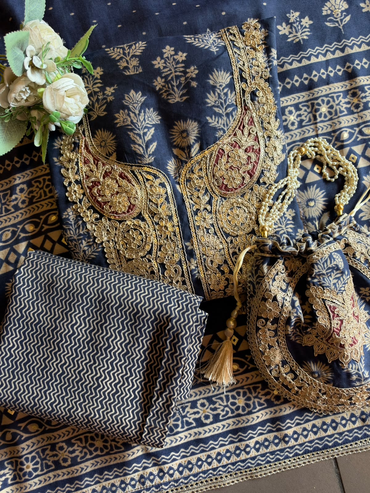 Ajrakh Printed Suit Set with Embroidered Potli