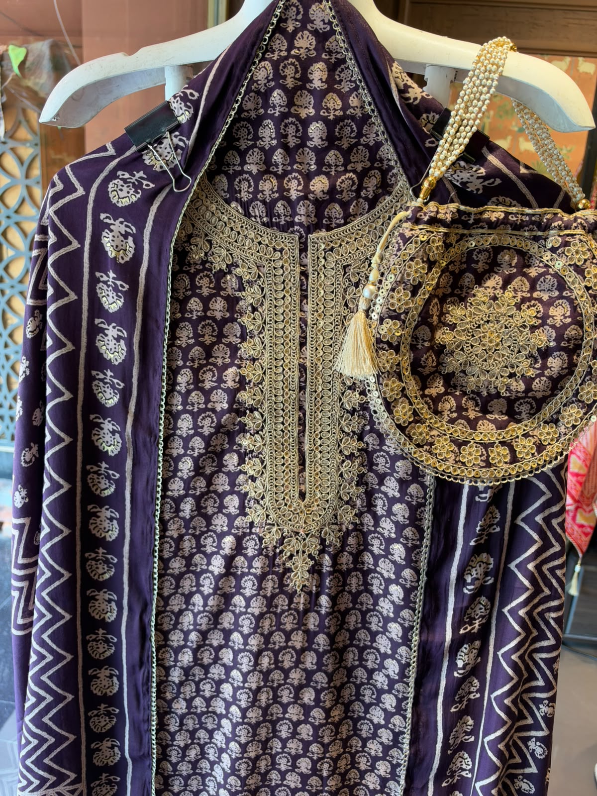 Muslin cotton Printed Suit Set with Embroidered Potli