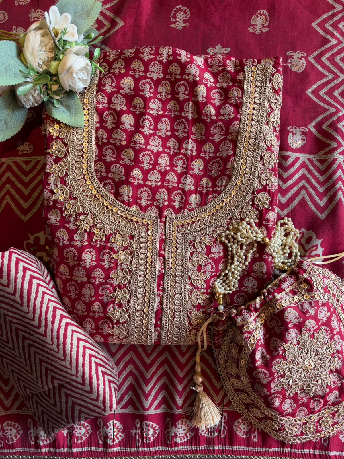 Muslin cotton Printed Suit Set with Embroidered Potli