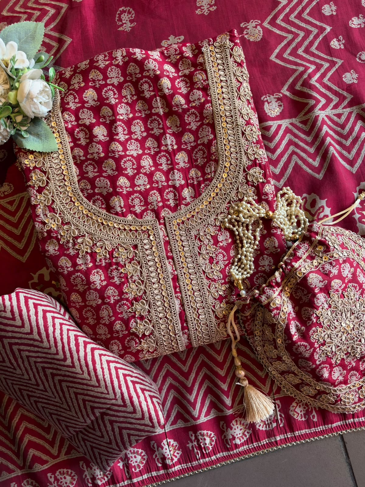 Muslin cotton Printed Suit Set with Embroidered Potli