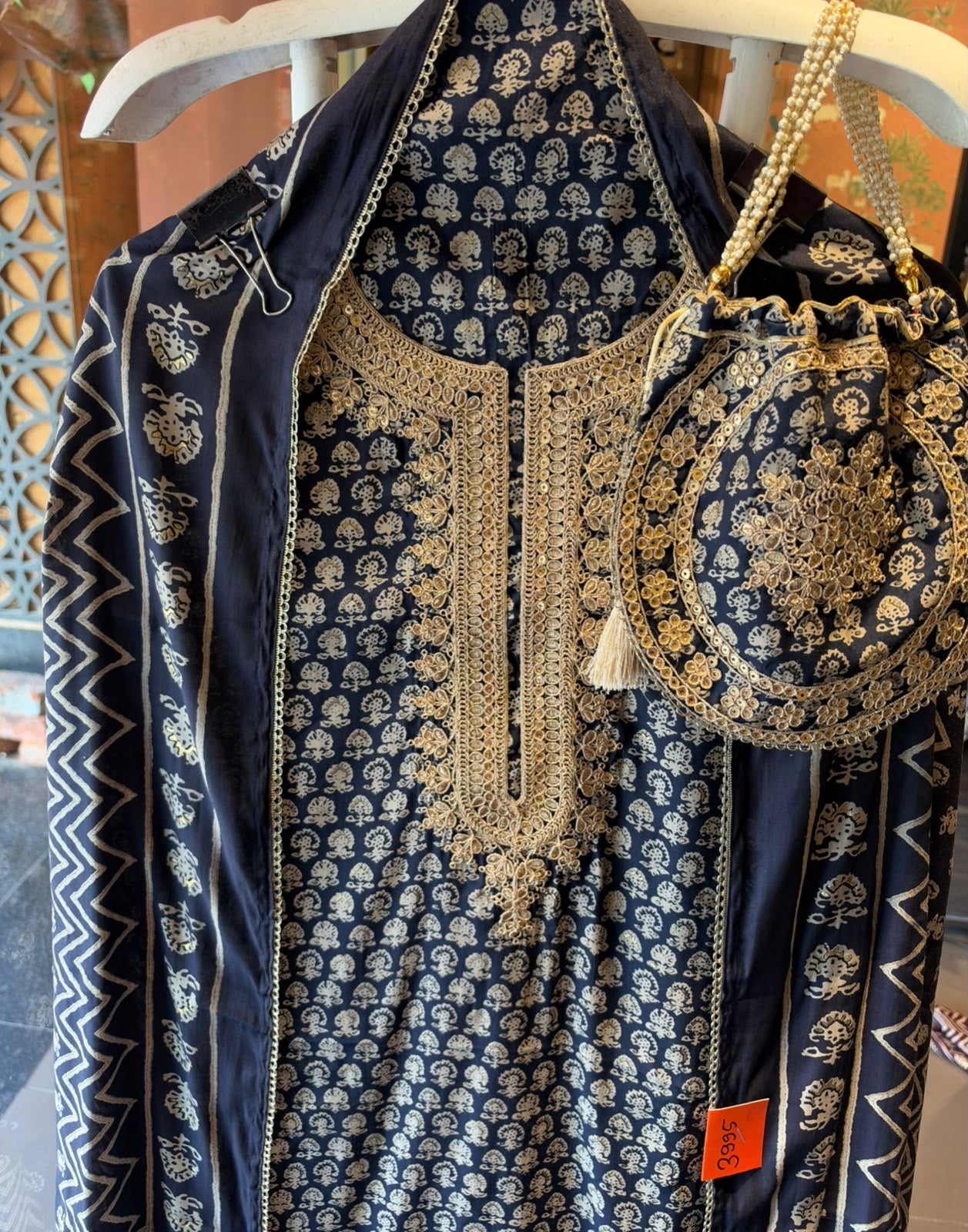 Muslin cotton Printed Suit Set with Embroidered Potli