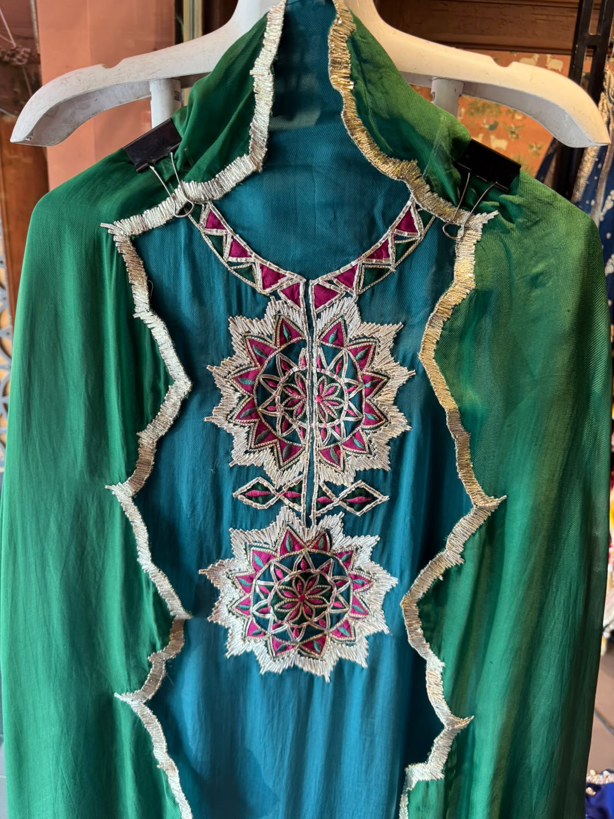 Multicoloured thread embroidery unstitched suit