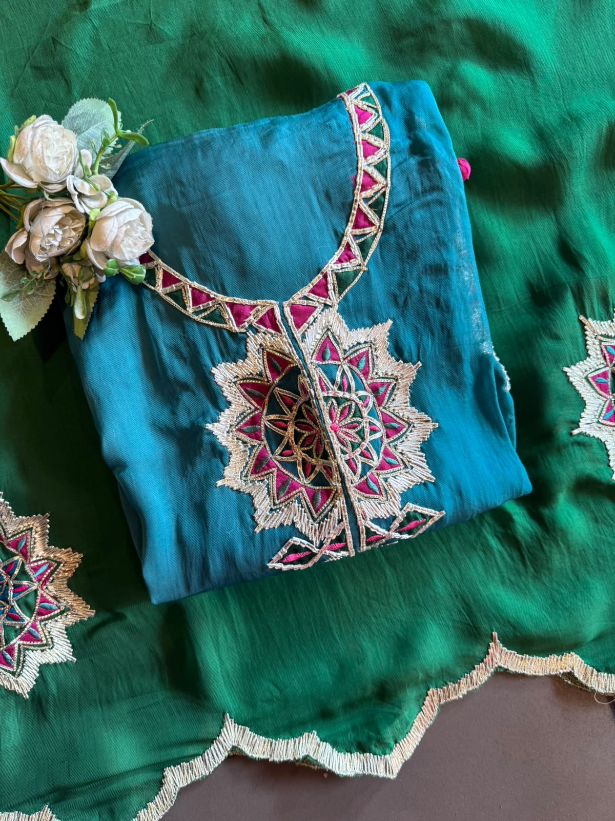 Multicoloured thread embroidery unstitched suit