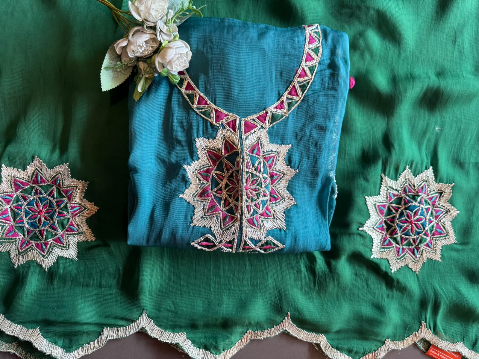 Multicoloured thread embroidery unstitched suit
