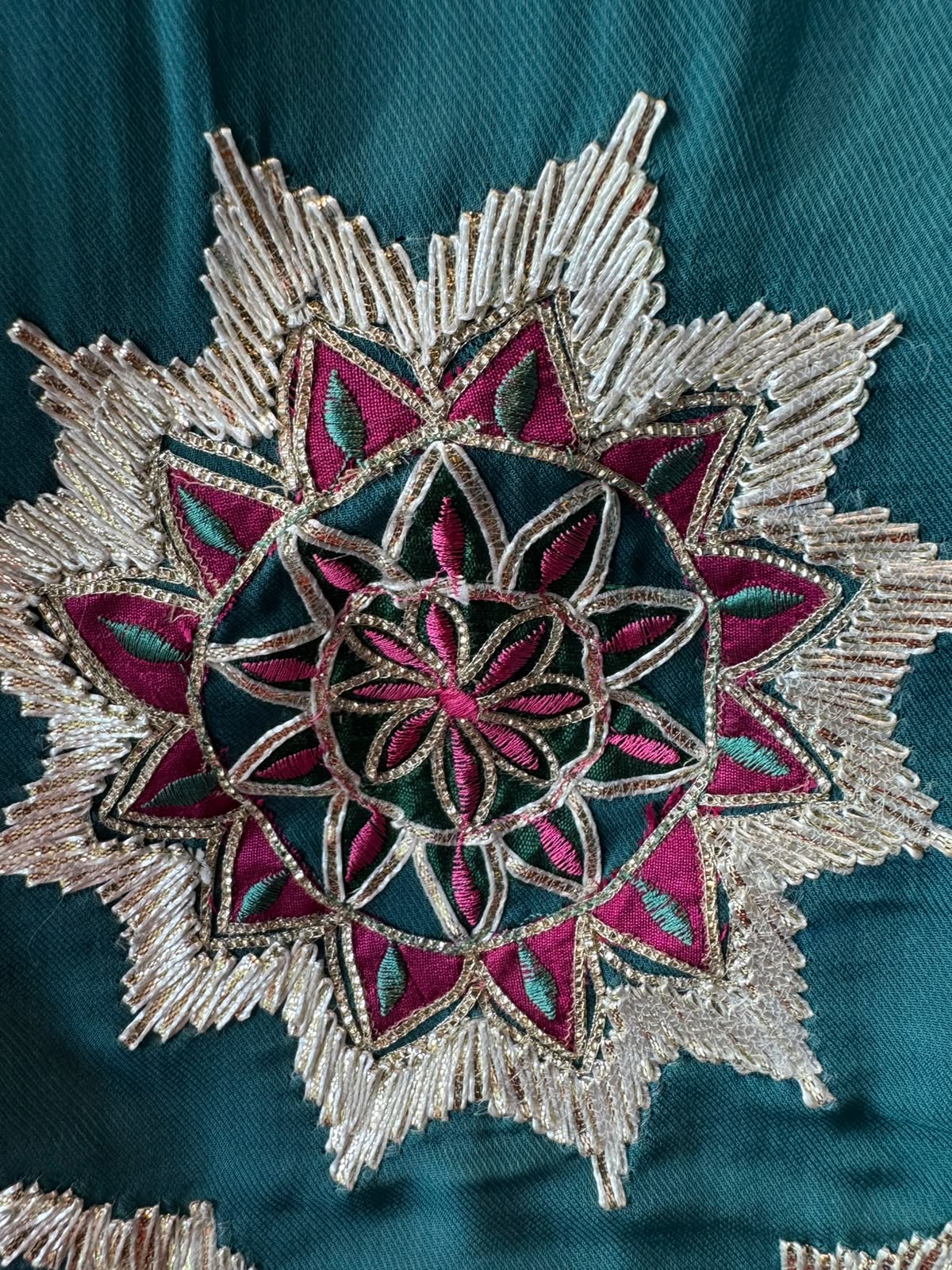 Multicoloured thread embroidery unstitched suit