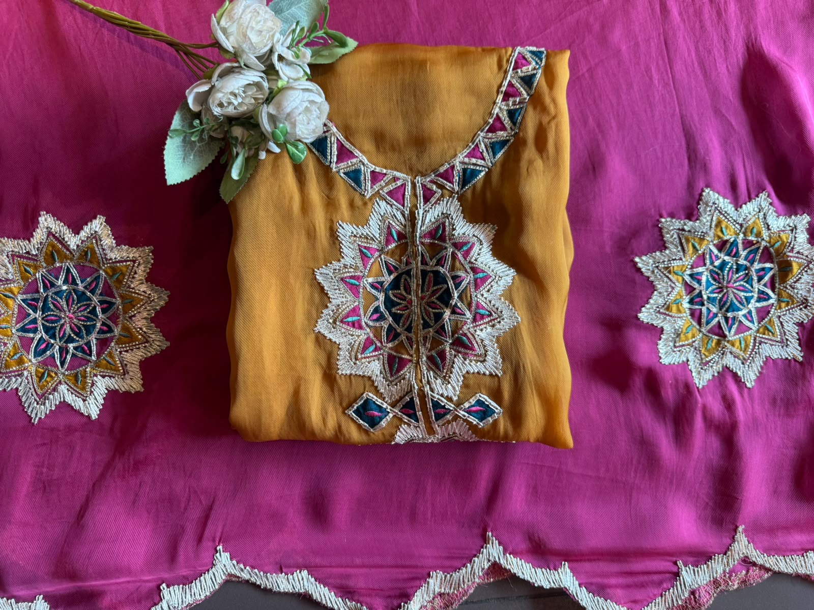 Multicoloured thread embroidery unstitched suit