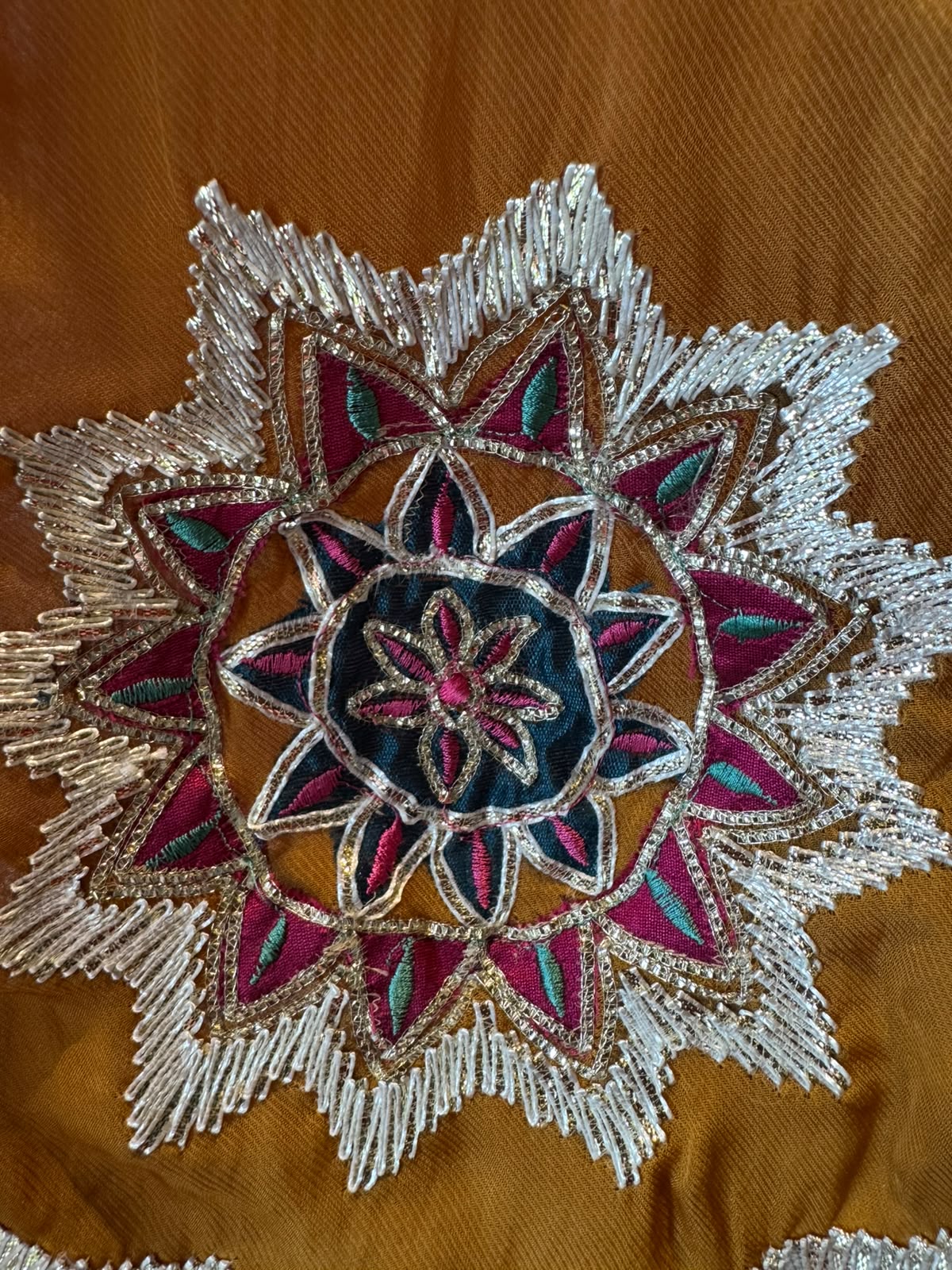 Multicoloured thread embroidery unstitched suit