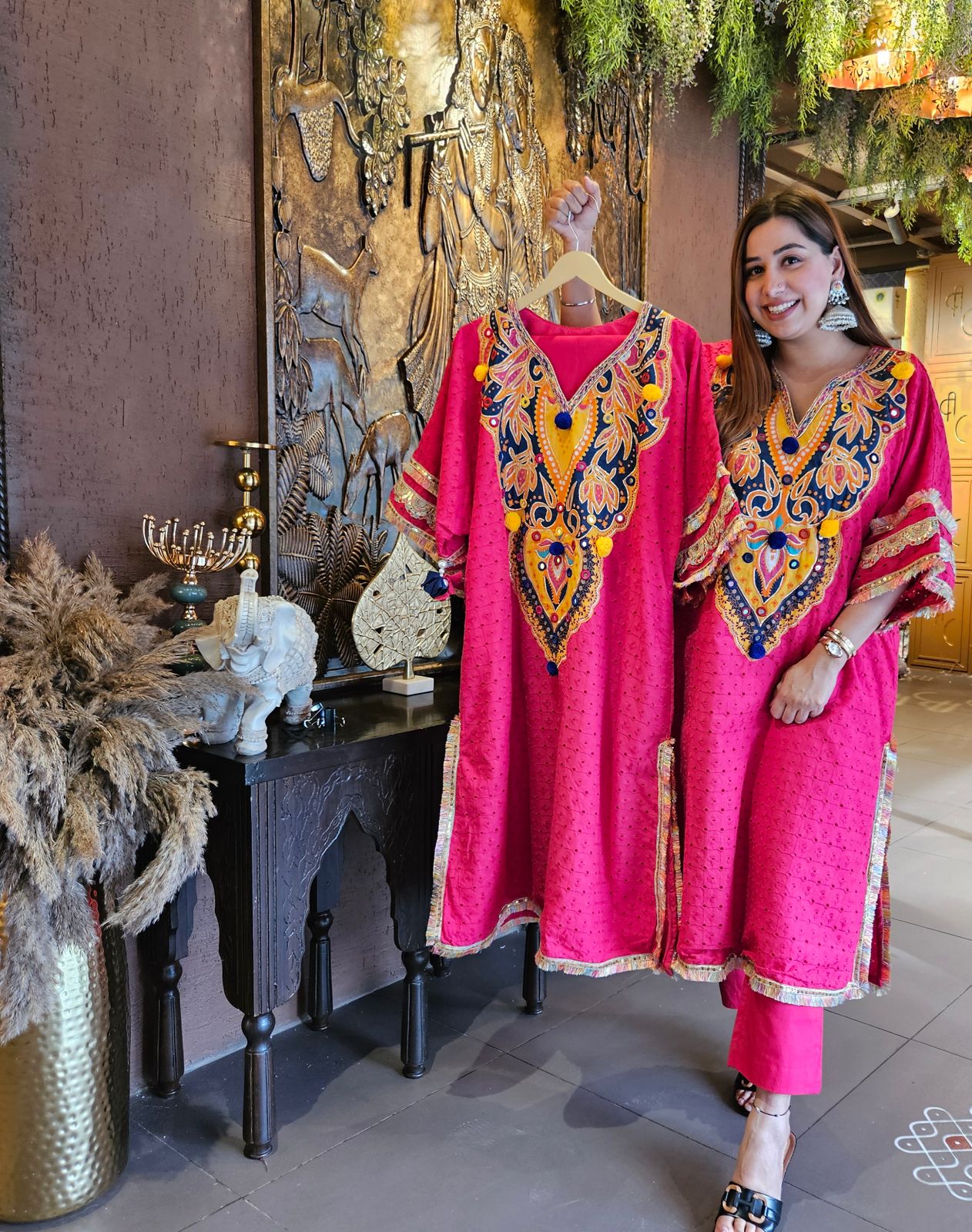 Beautiful Hakuba chicken tunic Looser fit with Gorgeous Mughal paisley print patch on the neckline with Pom Pom’s attached