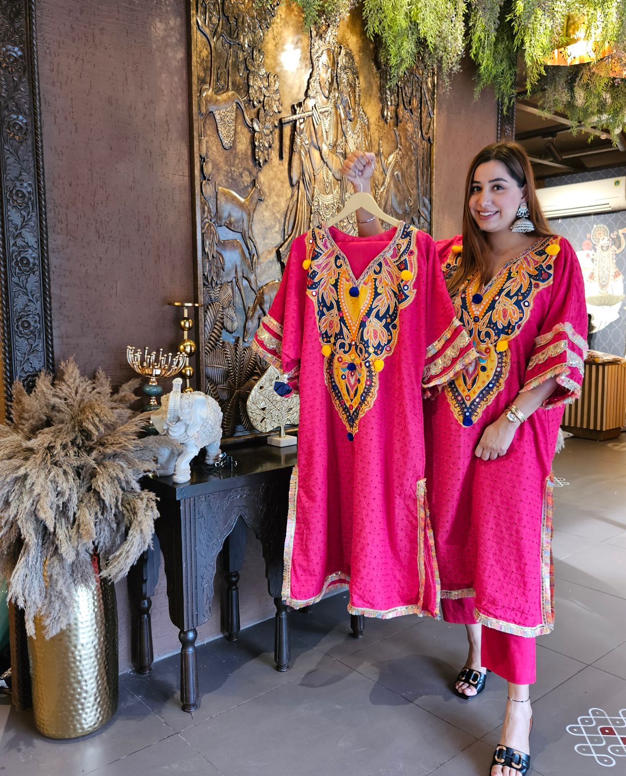 Beautiful Hakuba chicken tunic Looser fit with Gorgeous Mughal paisley print patch on the neckline with Pom Pom’s attached